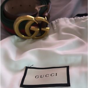 Gucci belt authentic only used once. No damages leather textured , size XL